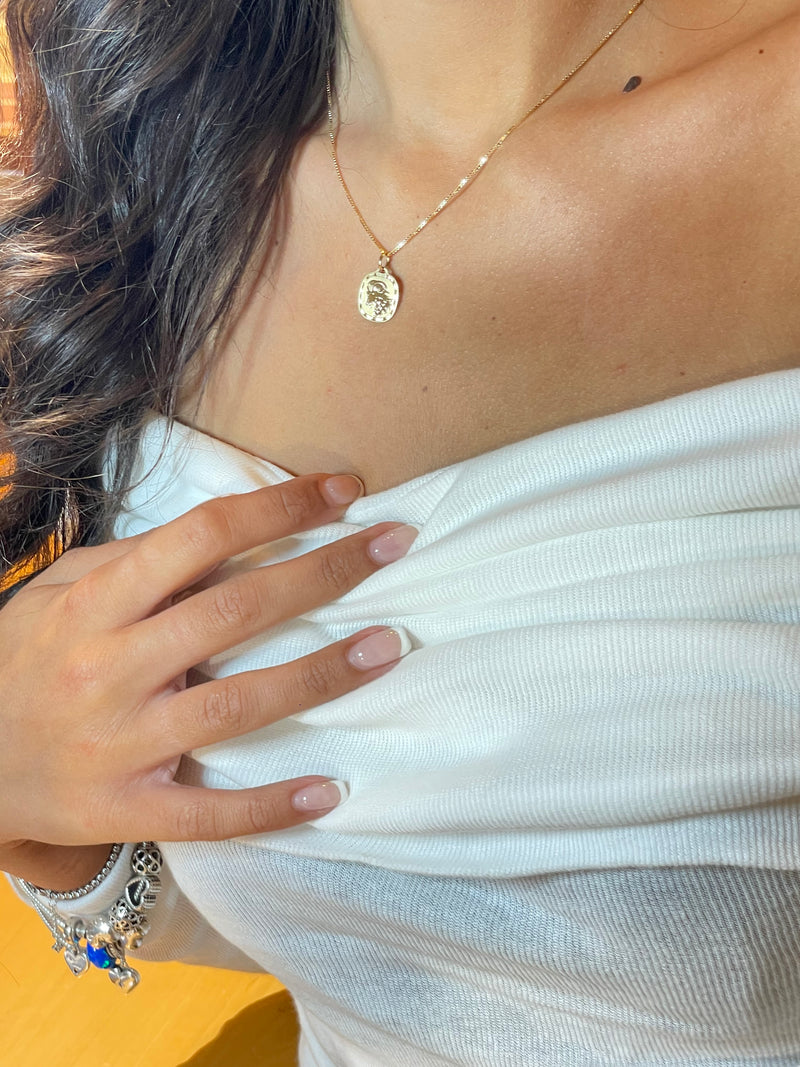 Ciondolo oro con segno zodiacale 18 kt. Possibilità di incisione personalizzata sul retro
