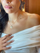 Ciondolo oro con segno zodiacale 18 kt. Possibilità di incisione personalizzata sul retro