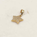 Ciondolo oro 18 kt. Stella con zirconi