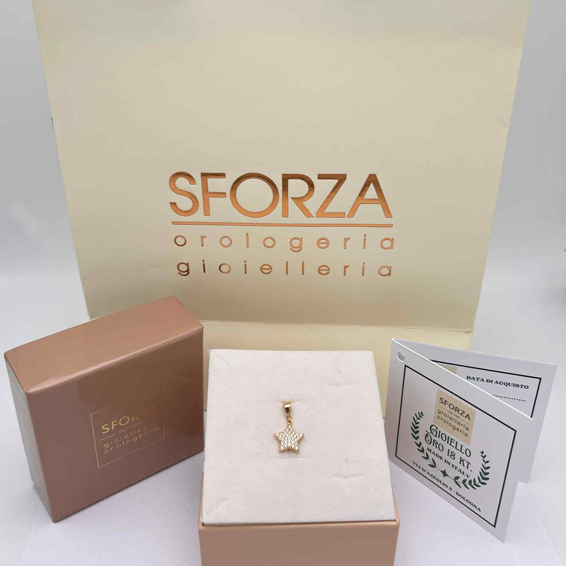 Ciondolo oro 18 kt. Stella con zirconi